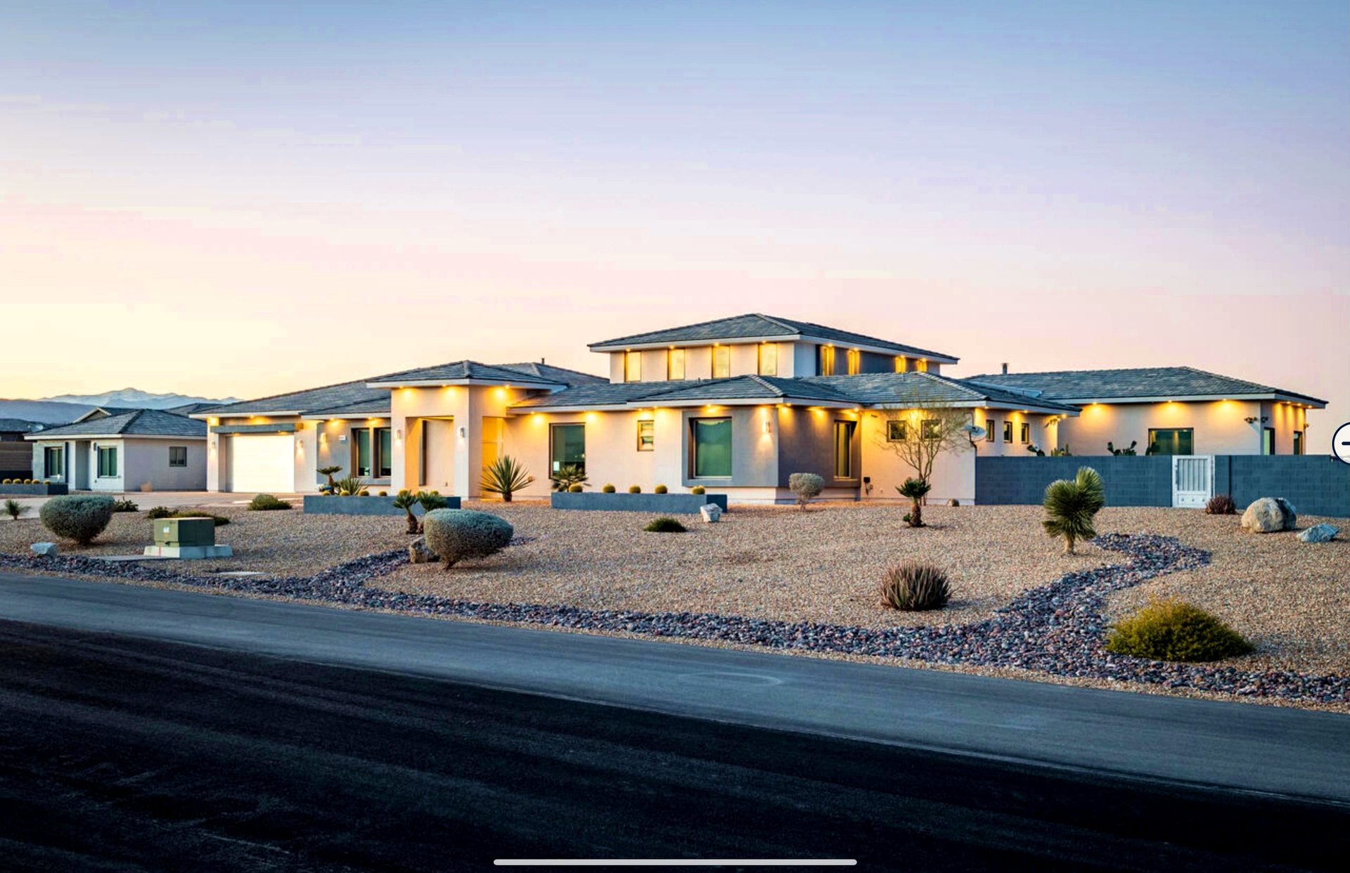 Custom Builds LLC luxury one-story home at dusk in southwest Las Vegas