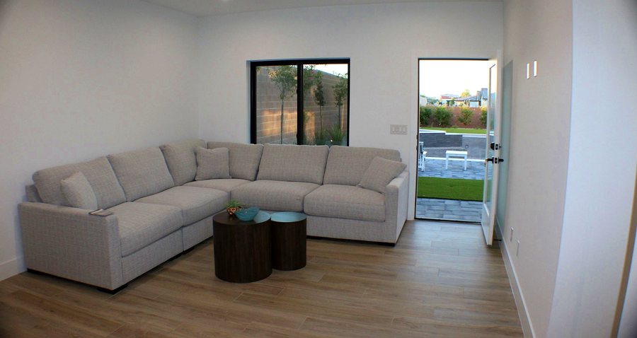 Great room interior opening to the rear yard